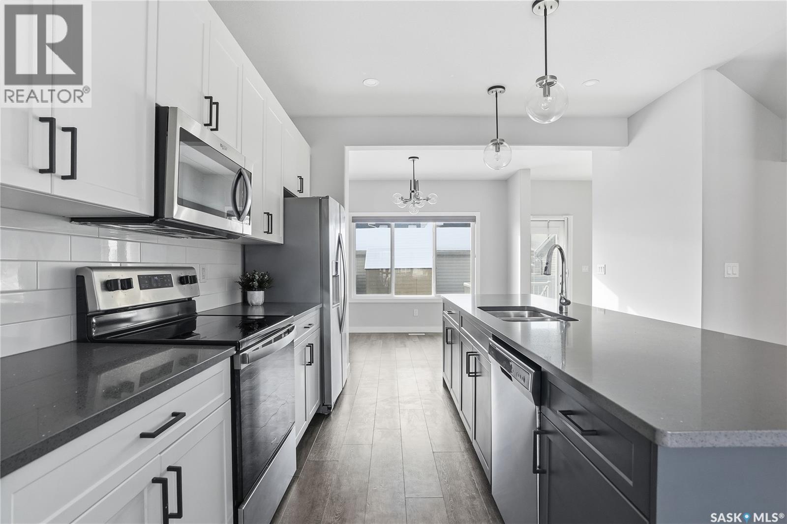 306 Brighton Boulevard, Saskatoon, SK - Indoor Photo Showing Kitchen With Upgraded Kitchen