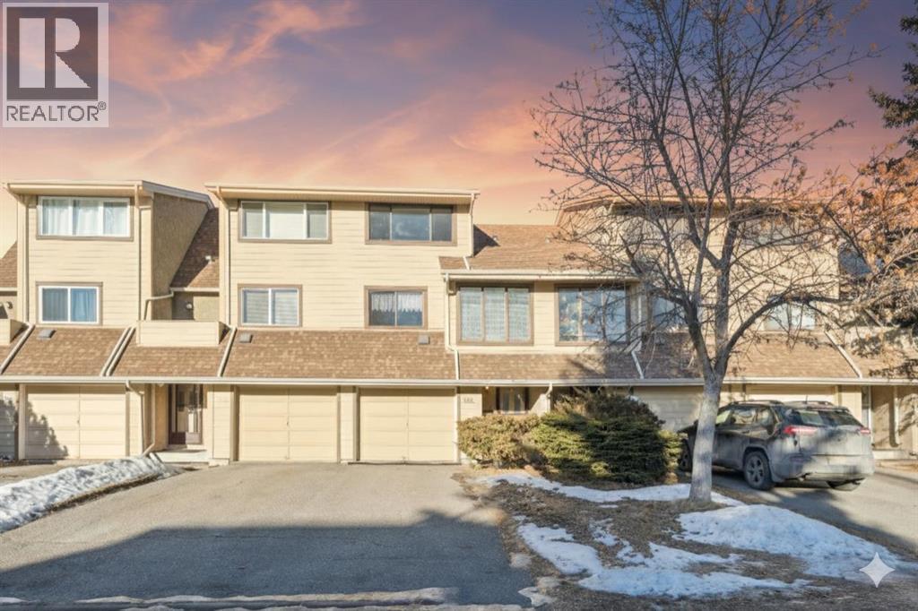 308 Woodvale Crescent Sw, Calgary, AB - Outdoor With Facade