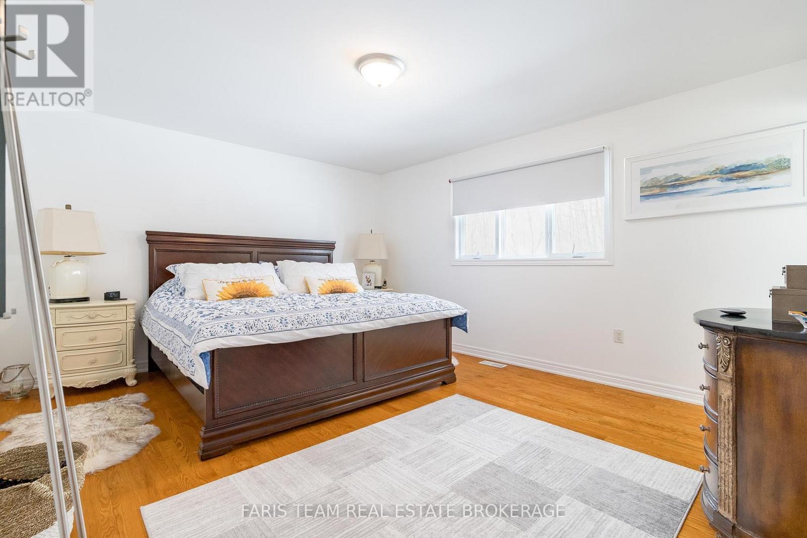 100 Desroches Trail, Tiny, ON - Indoor Photo Showing Bedroom