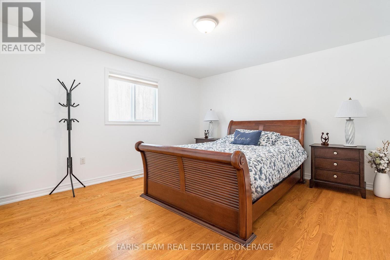 100 Desroches Trail, Tiny, ON - Indoor Photo Showing Bedroom
