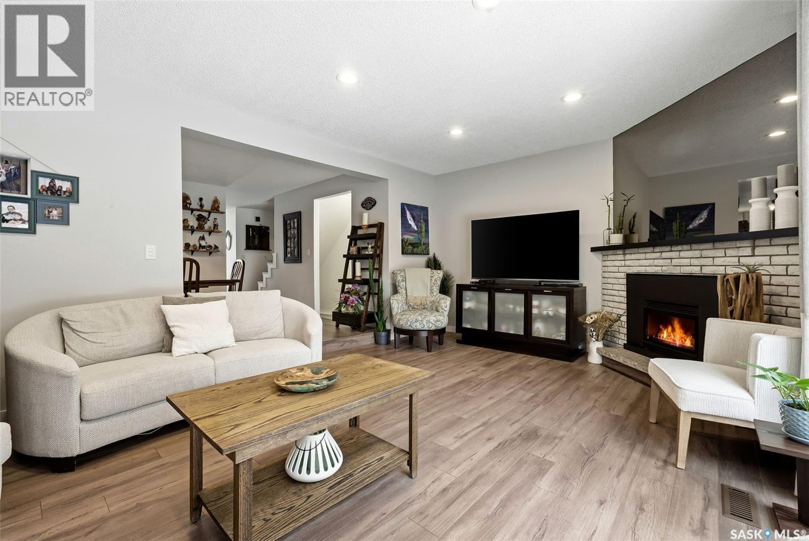 198 Plainsview Drive, Regina, SK - Indoor Photo Showing Living Room With Fireplace