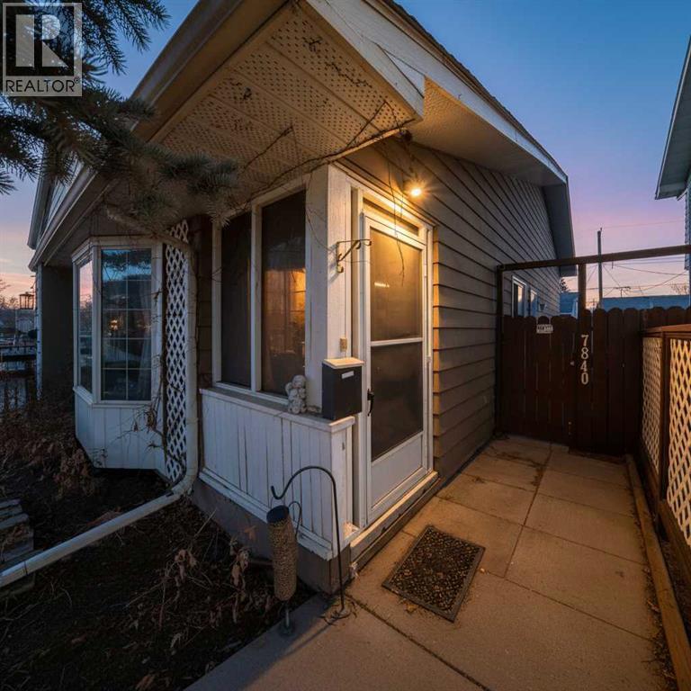 Your home welcomes you with this adorable front porch - 7840 20A Street Se, Calgary, AB - Outdoor With Exterior