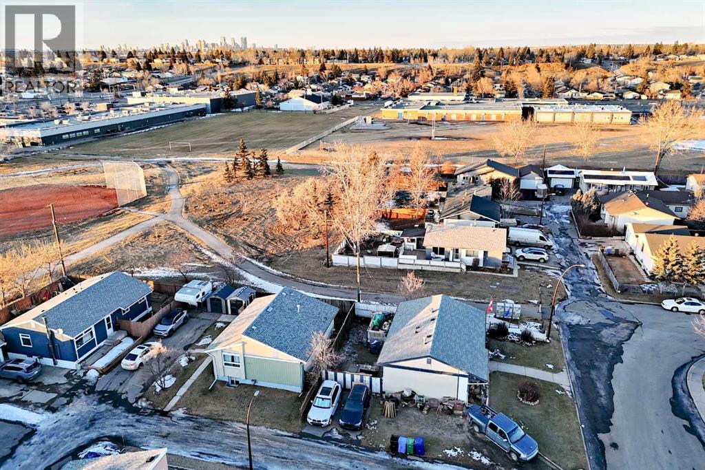 A school a half block away - 7840 20A Street Se, Calgary, AB - Outdoor With View