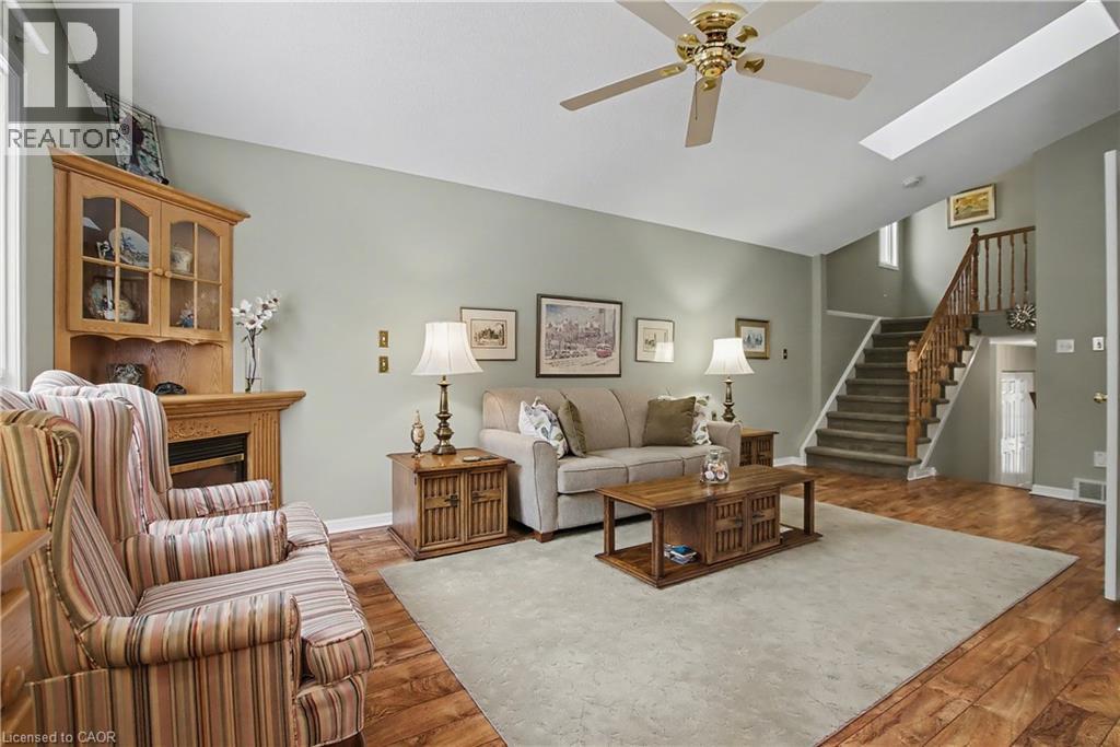 Turn on the fireplace and snuggle in! - 252 Keewatin Avenue, Kitchener, ON - Indoor Photo Showing Living Room With Fireplace