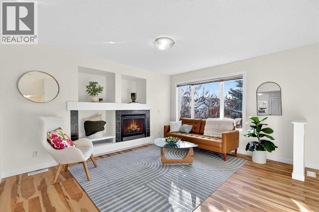 109 Copperstone Grove Se, Calgary, AB - Indoor Photo Showing Living Room With Fireplace