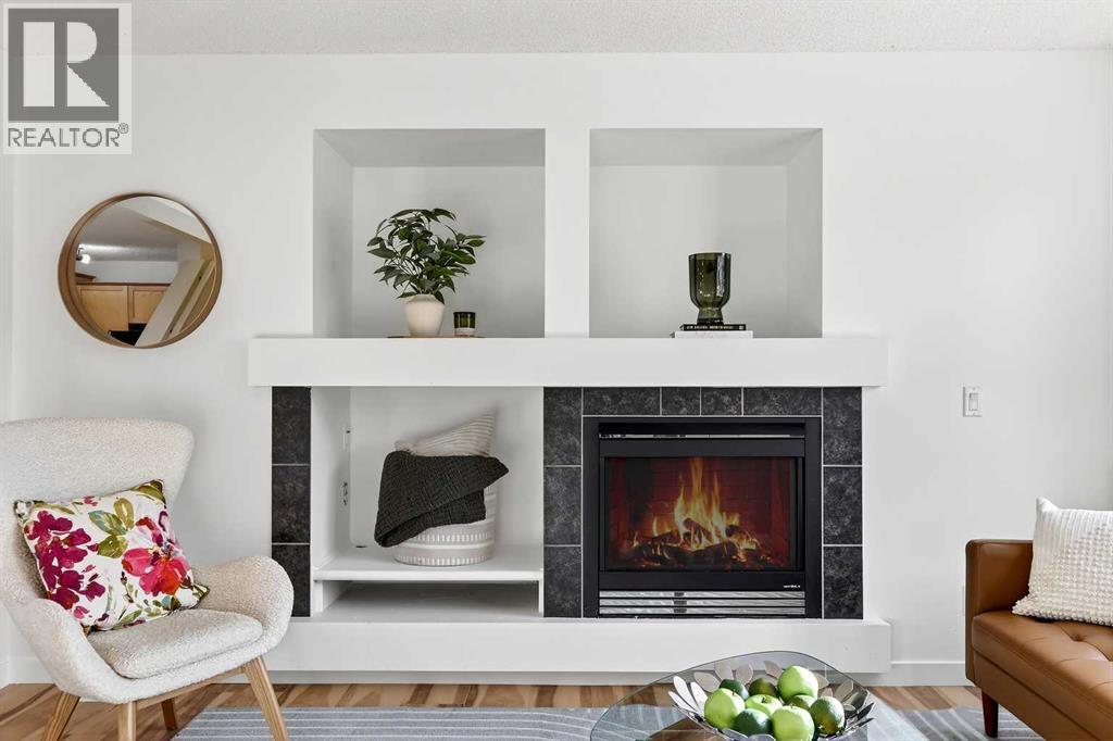 109 Copperstone Grove Se, Calgary, AB - Indoor Photo Showing Living Room With Fireplace