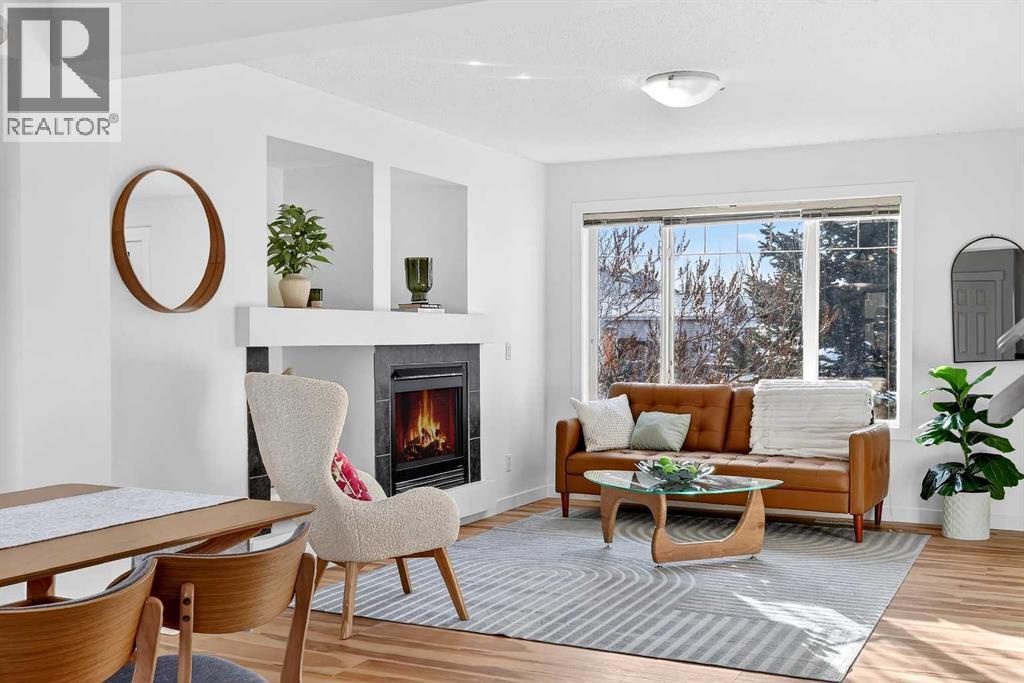 109 Copperstone Grove Se, Calgary, AB - Indoor Photo Showing Living Room With Fireplace