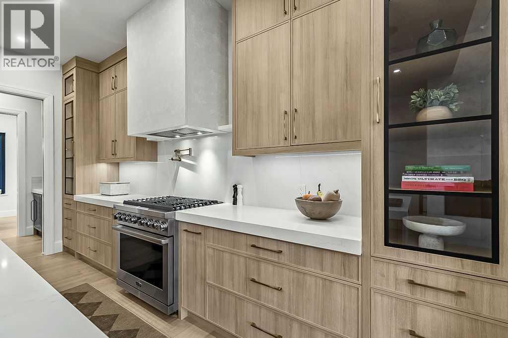 56 Lissington Drive Sw, Calgary, AB - Indoor Photo Showing Kitchen With Upgraded Kitchen