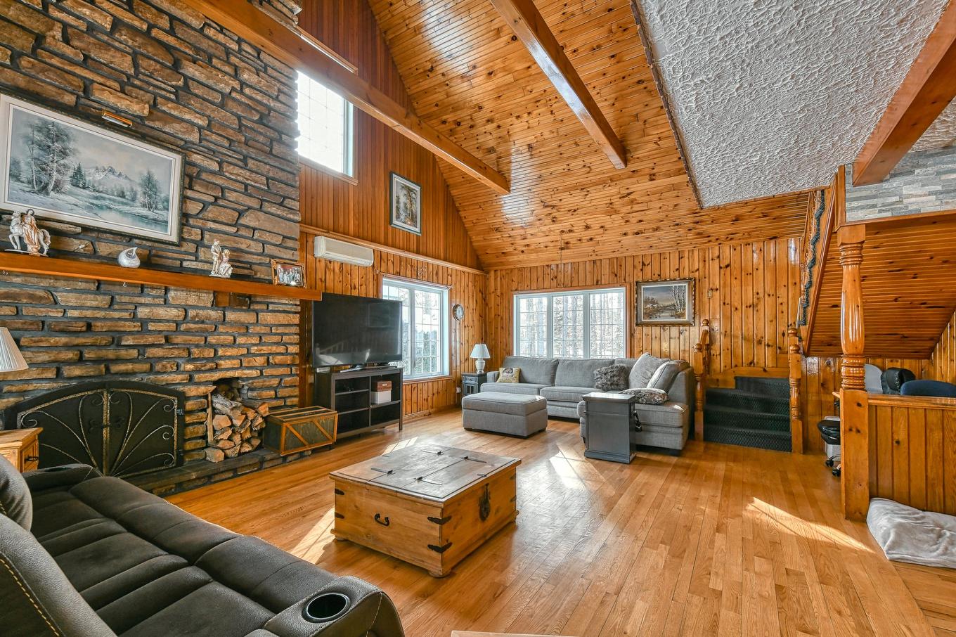 Living room - 10 Av. David, Saint-Sauveur, QC - Indoor Photo Showing Living Room With Fireplace