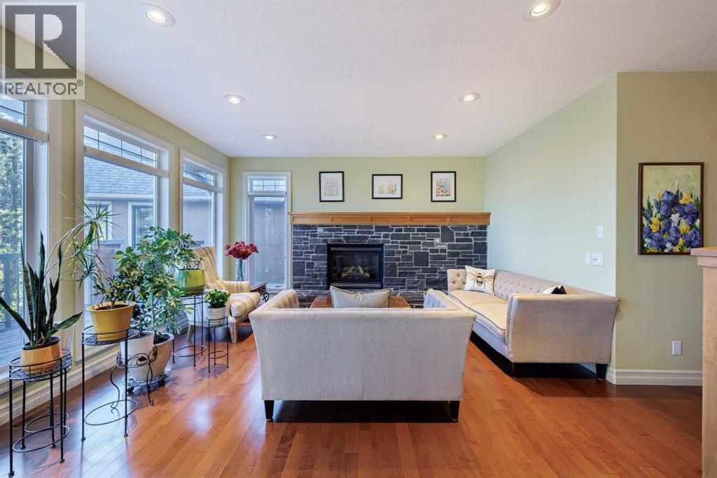 118 Tusslewood Heights Nw, Calgary, AB - Indoor Photo Showing Living Room With Fireplace