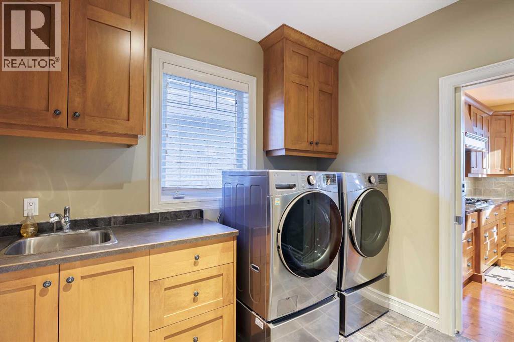 118 Tusslewood Heights Nw, Calgary, AB - Indoor Photo Showing Laundry Room