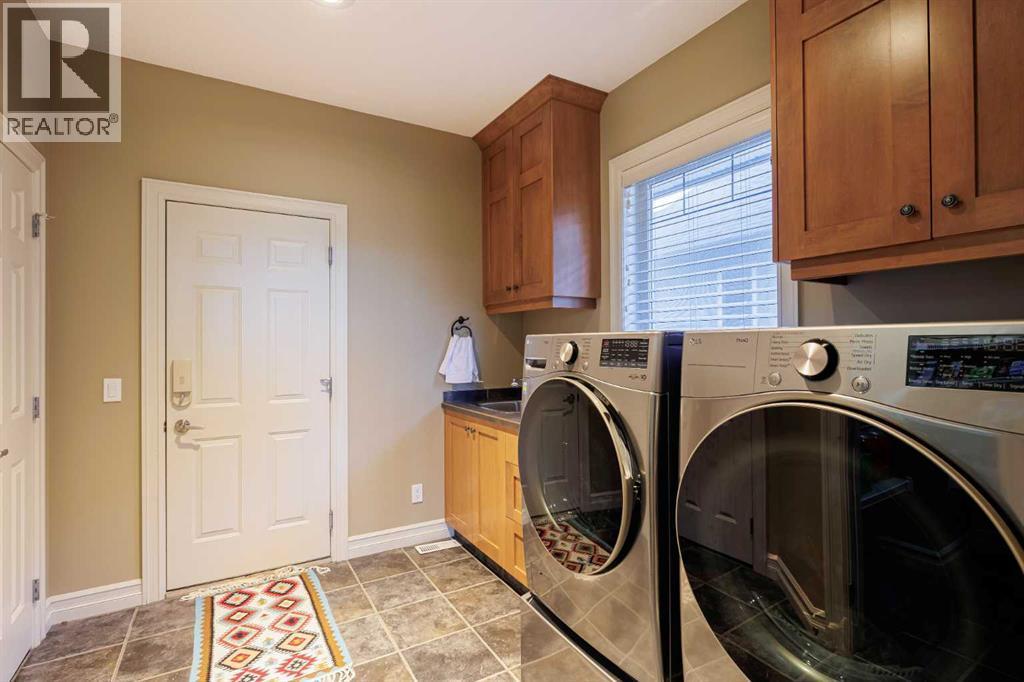 118 Tusslewood Heights Nw, Calgary, AB - Indoor Photo Showing Laundry Room