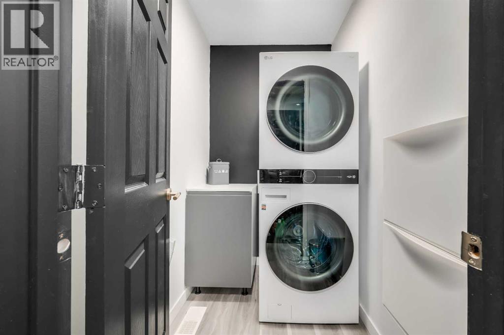 165 Everstone Drive Sw, Calgary, AB - Indoor Photo Showing Laundry Room