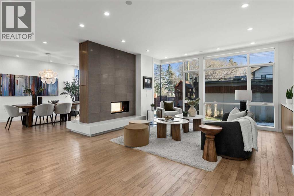 3216 5 Street Nw, Calgary, AB - Indoor Photo Showing Living Room With Fireplace