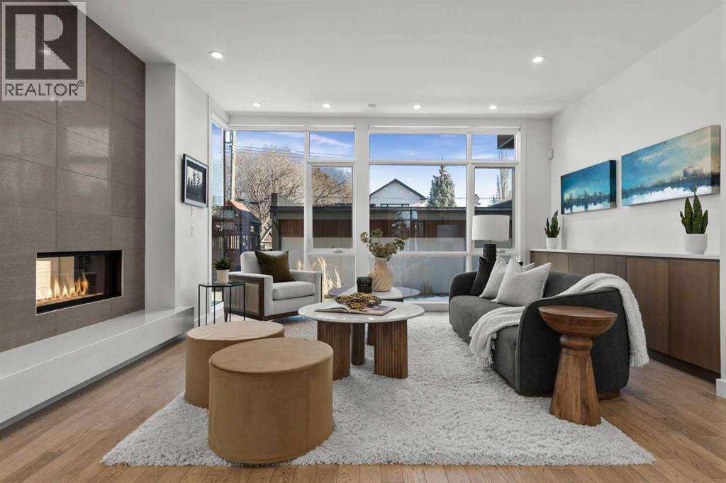 3216 5 Street Nw, Calgary, AB - Indoor Photo Showing Living Room With Fireplace