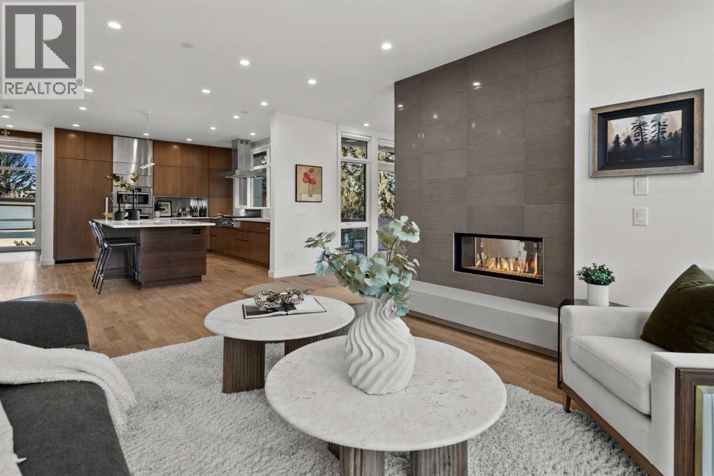 3216 5 Street Nw, Calgary, AB - Indoor Photo Showing Living Room With Fireplace
