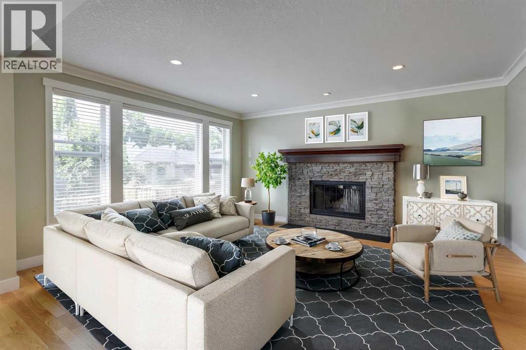 Living Room- Virtually Staged - 417 29 Avenue Nw, Calgary, AB - Indoor Photo Showing Living Room With Fireplace