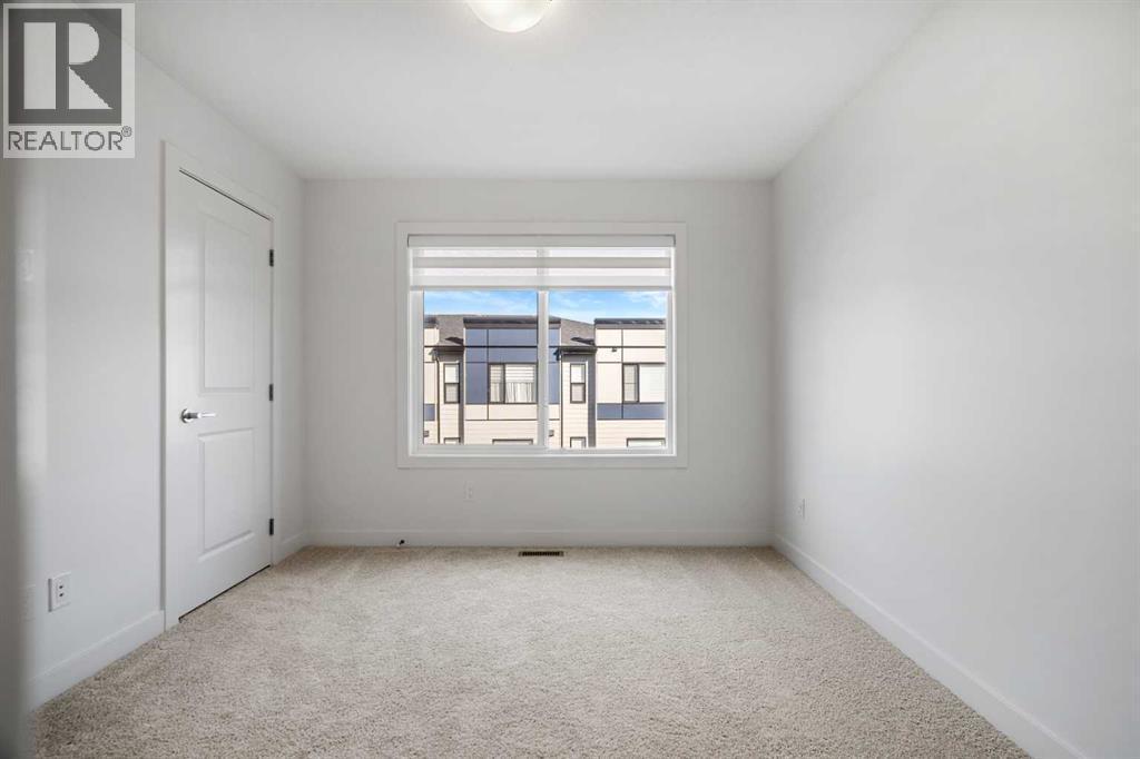 302, 550 Seton Circle Se, Calgary, AB - Indoor Photo Showing Other Room