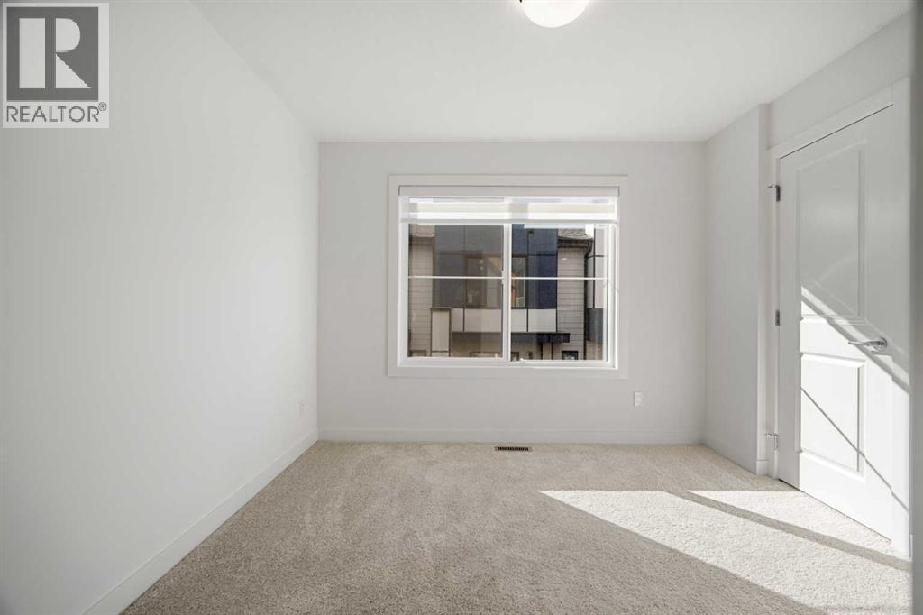 302, 550 Seton Circle Se, Calgary, AB - Indoor Photo Showing Other Room