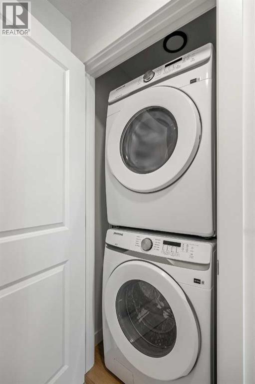 302, 550 Seton Circle Se, Calgary, AB - Indoor Photo Showing Laundry Room