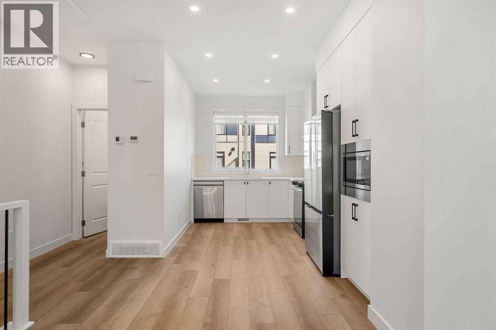 302, 550 Seton Circle Se, Calgary, AB - Indoor Photo Showing Kitchen
