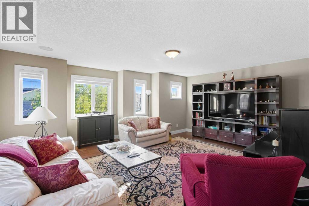 Bonus Room upper - 41 Evergreen Mount Sw, Calgary, AB - Indoor Photo Showing Living Room