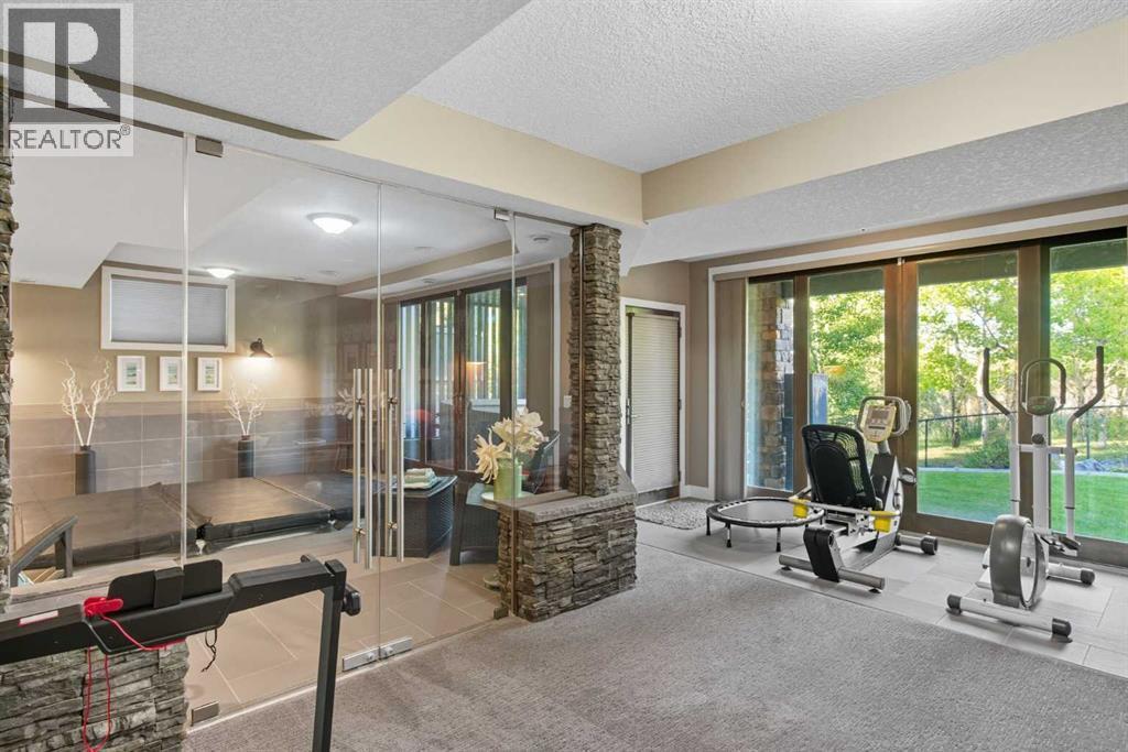 Pool Room/Exercise Area - 41 Evergreen Mount Sw, Calgary, AB - Indoor Photo Showing Gym Room