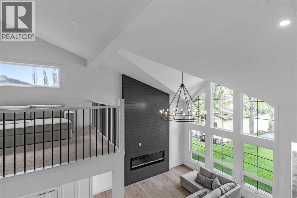 FAMILY ROOM - 340 West Chestermere Drive, Chestermere, AB - Indoor Photo Showing Other Room