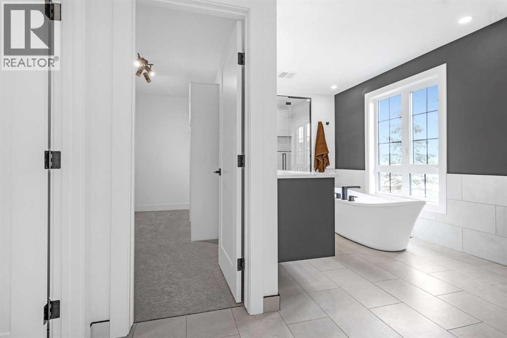 PRIMARY BEDROOM ENSUITE - 340 West Chestermere Drive, Chestermere, AB - Indoor