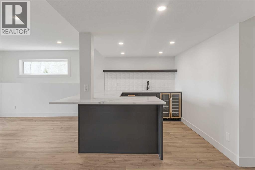 BASEMENT WET BAR - 340 West Chestermere Drive, Chestermere, AB - Indoor Photo Showing Other Room