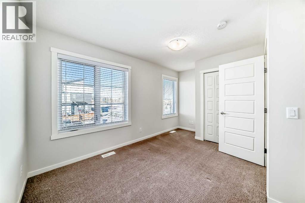 307, 474 Seton Circle Se, Calgary, AB - Indoor Photo Showing Other Room