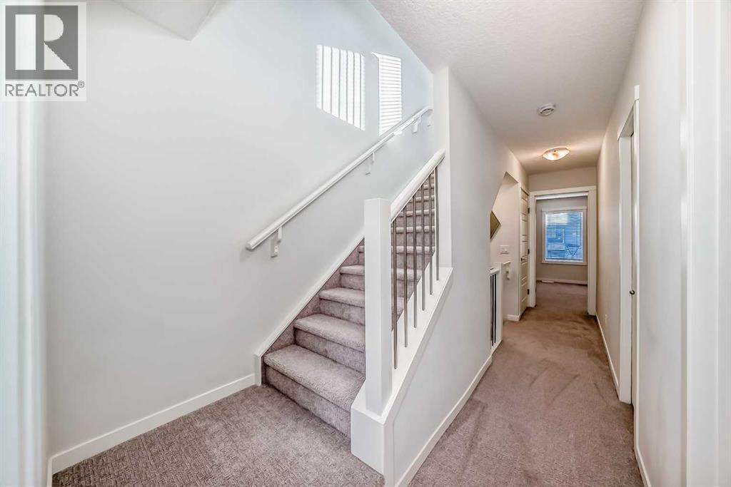 307, 474 Seton Circle Se, Calgary, AB - Indoor Photo Showing Other Room