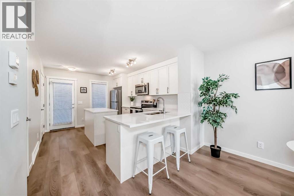 307, 474 Seton Circle Se, Calgary, AB - Indoor Photo Showing Kitchen