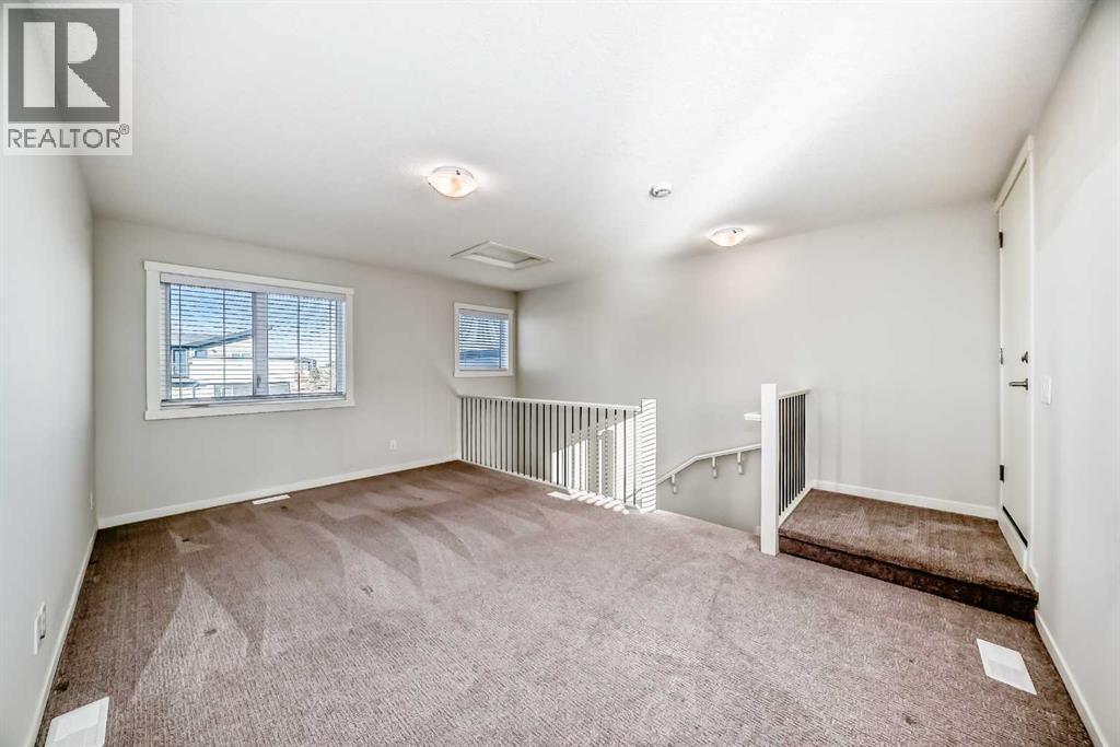 307, 474 Seton Circle Se, Calgary, AB - Indoor Photo Showing Other Room