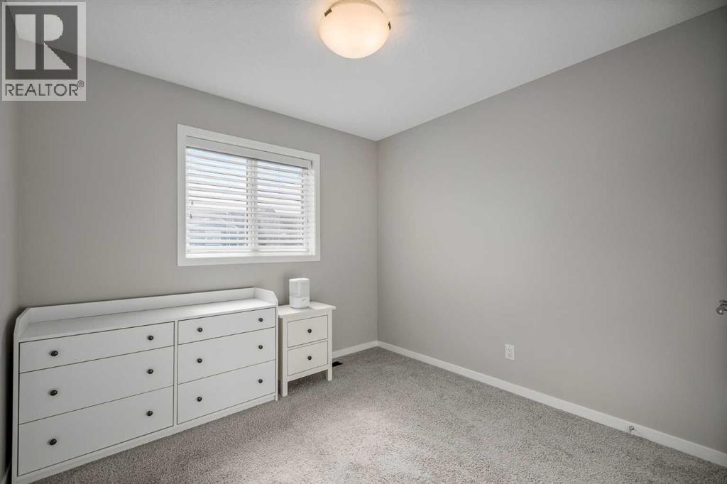 63 Masters Crescent Se, Calgary, AB - Indoor Photo Showing Bedroom