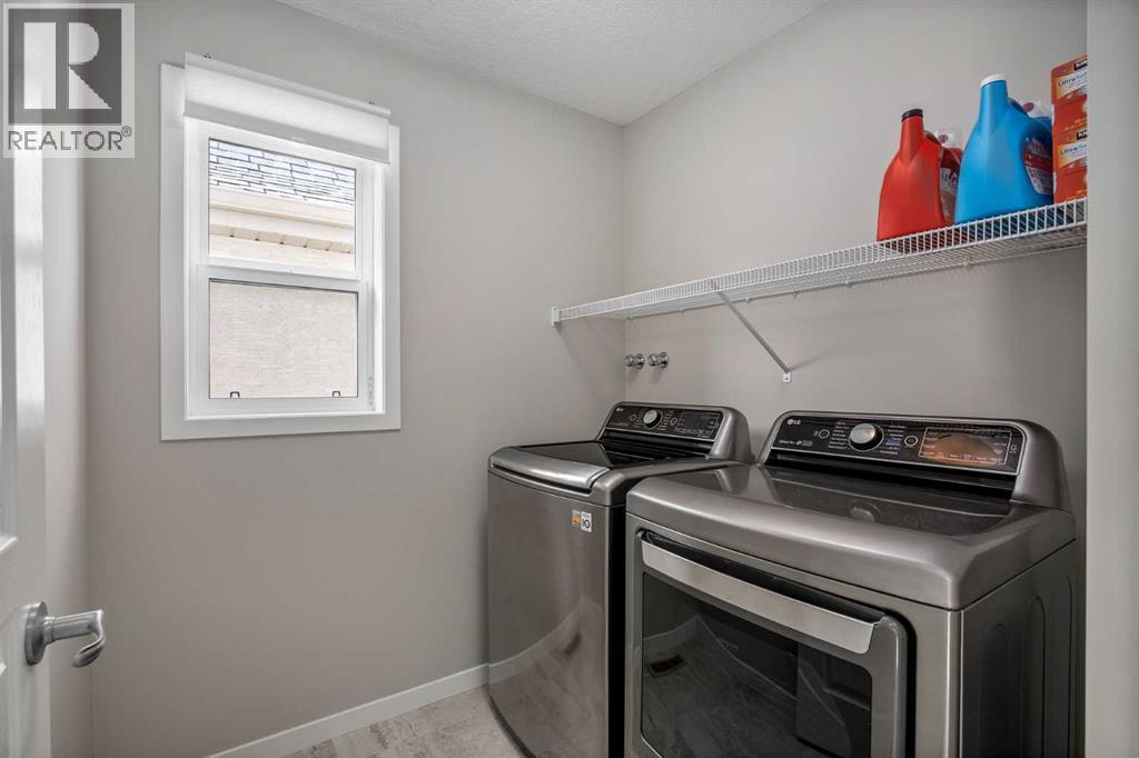 63 Masters Crescent Se, Calgary, AB - Indoor Photo Showing Laundry Room