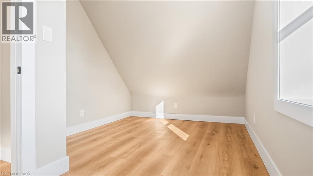 Bonus room featuring wood finished floors and lofted ceiling - 491 Upper Wentworth Street, Hamilton, ON - Indoor Photo Showing Other Room