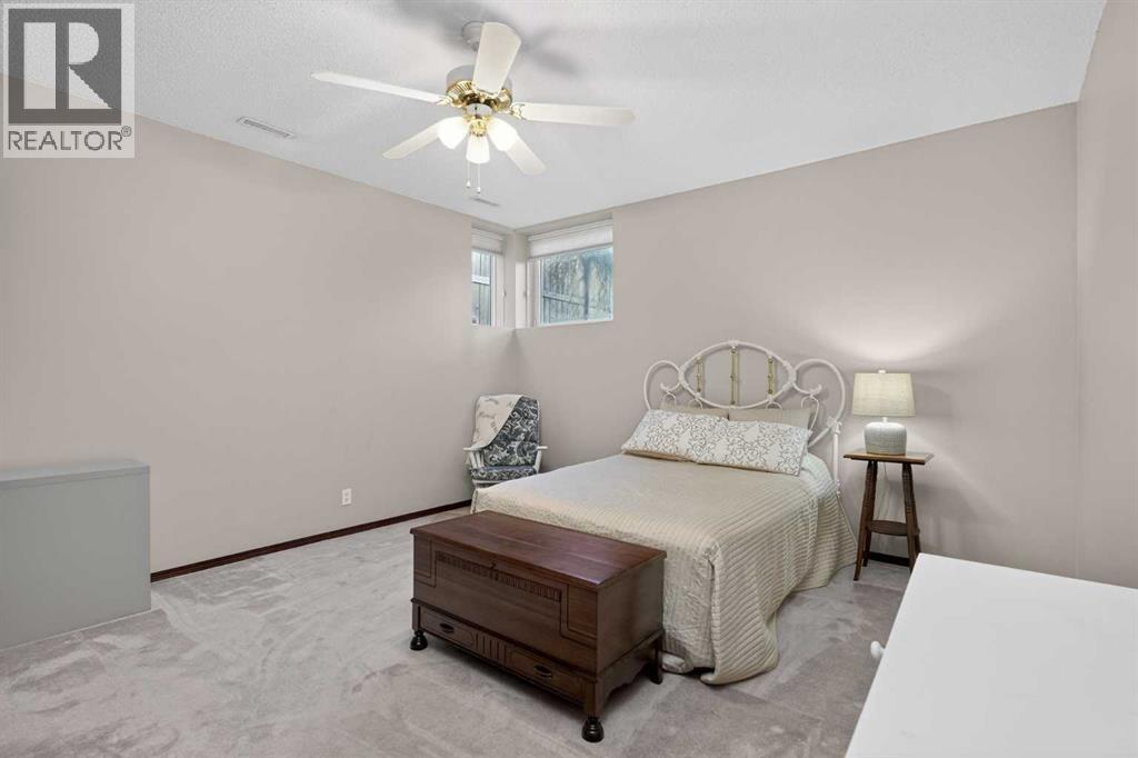 Bedroom #4 (in basement) - 150 Somerset Close Sw, Calgary, AB - Indoor Photo Showing Bedroom