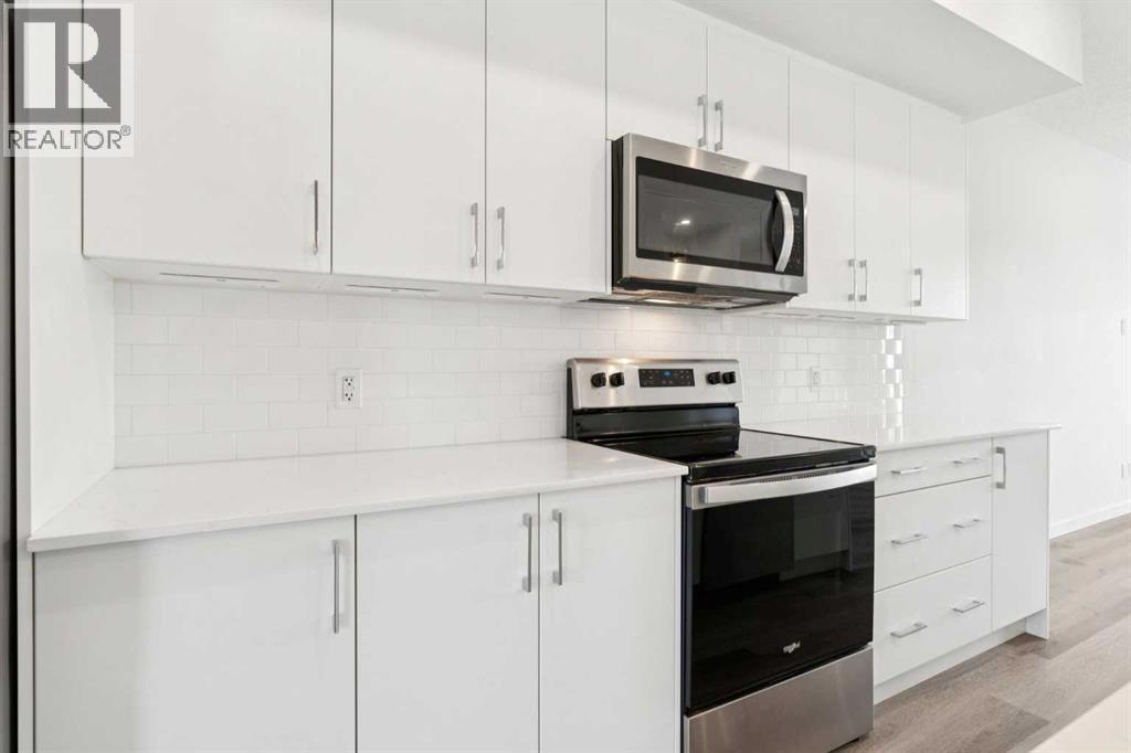 54 Evanscrest Manor Nw, Calgary, AB - Indoor Photo Showing Kitchen With Upgraded Kitchen