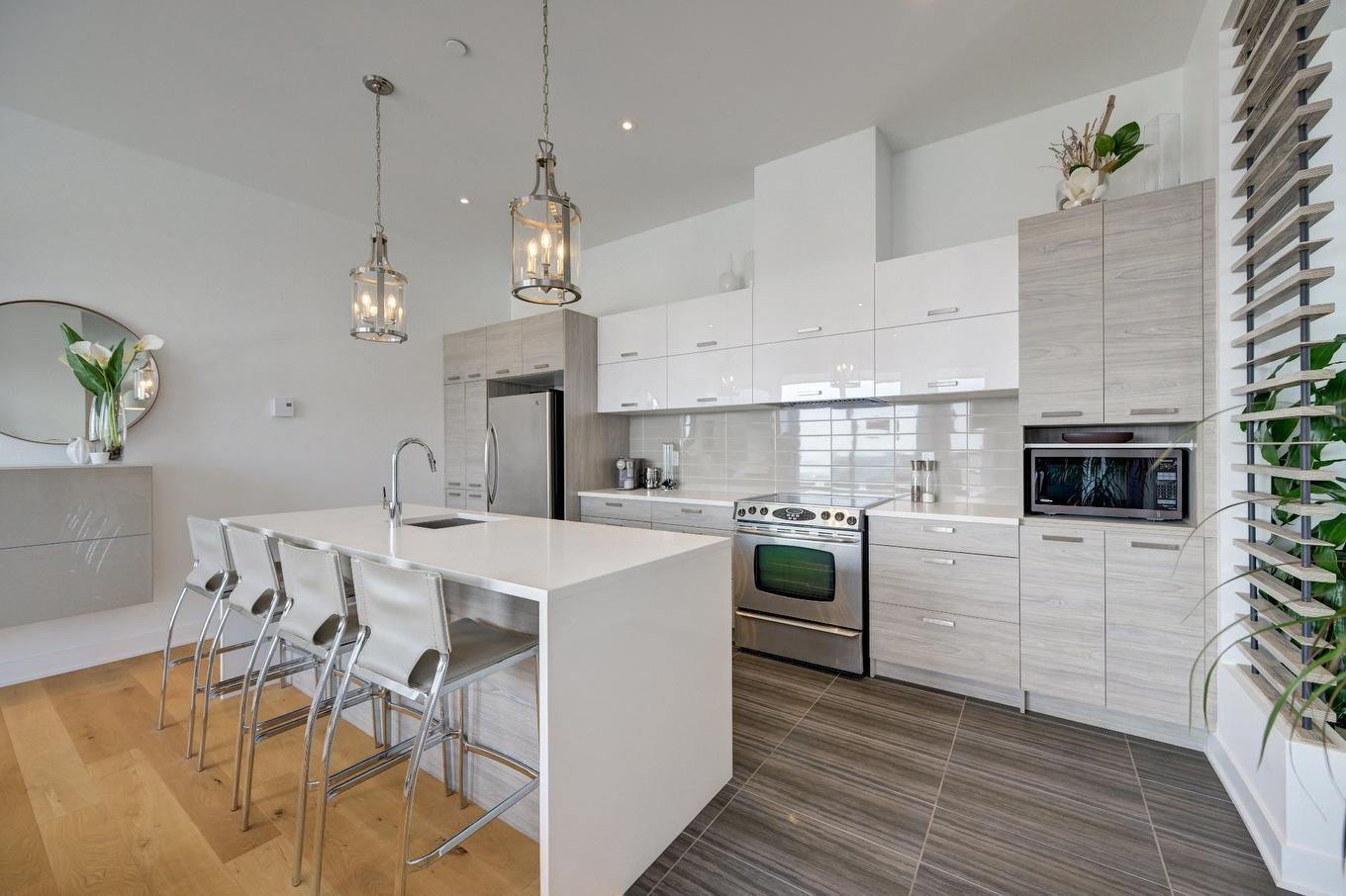Cuisine - 1702-1400 Rue Lucien-Paiement, Laval (Laval-Des-Rapides), QC - Indoor Photo Showing Kitchen With Upgraded Kitchen