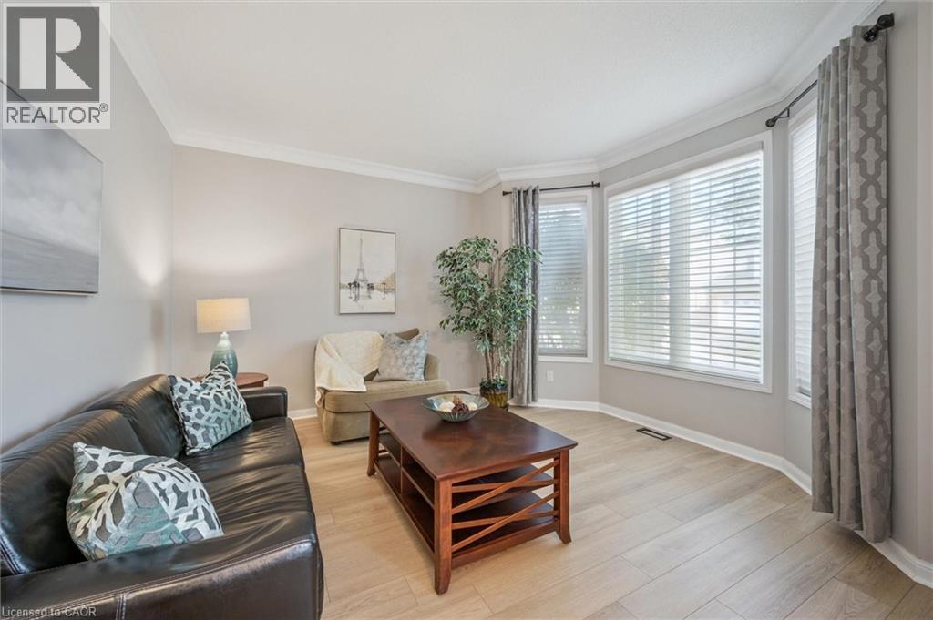 Living Room with large windows off of Entry - 79 Zieman Crescent, Cambridge, ON - Indoor Photo Showing Living Room