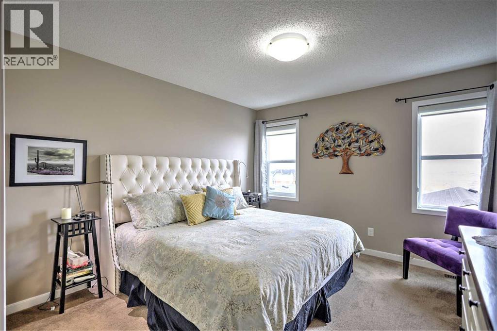 388 Auburn Crest Way Se, Calgary, AB - Indoor Photo Showing Bedroom