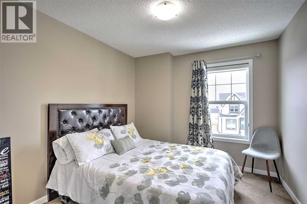388 Auburn Crest Way Se, Calgary, AB - Indoor Photo Showing Bedroom