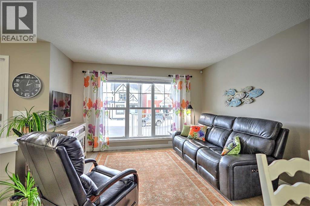 388 Auburn Crest Way Se, Calgary, AB - Indoor Photo Showing Living Room