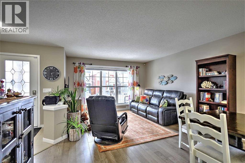 388 Auburn Crest Way Se, Calgary, AB - Indoor Photo Showing Living Room