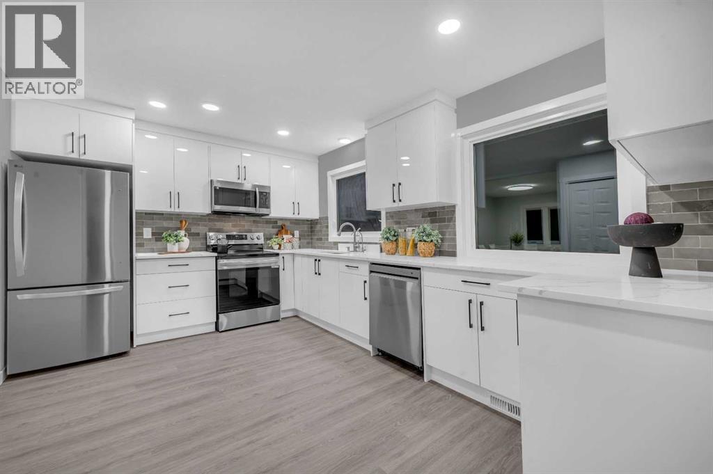 5868 Dalcastle Drive Nw, Calgary, AB - Indoor Photo Showing Kitchen With Upgraded Kitchen