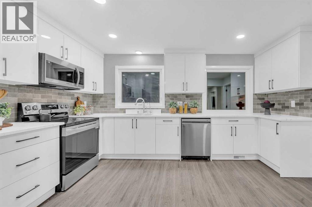5868 Dalcastle Drive Nw, Calgary, AB - Indoor Photo Showing Kitchen With Upgraded Kitchen