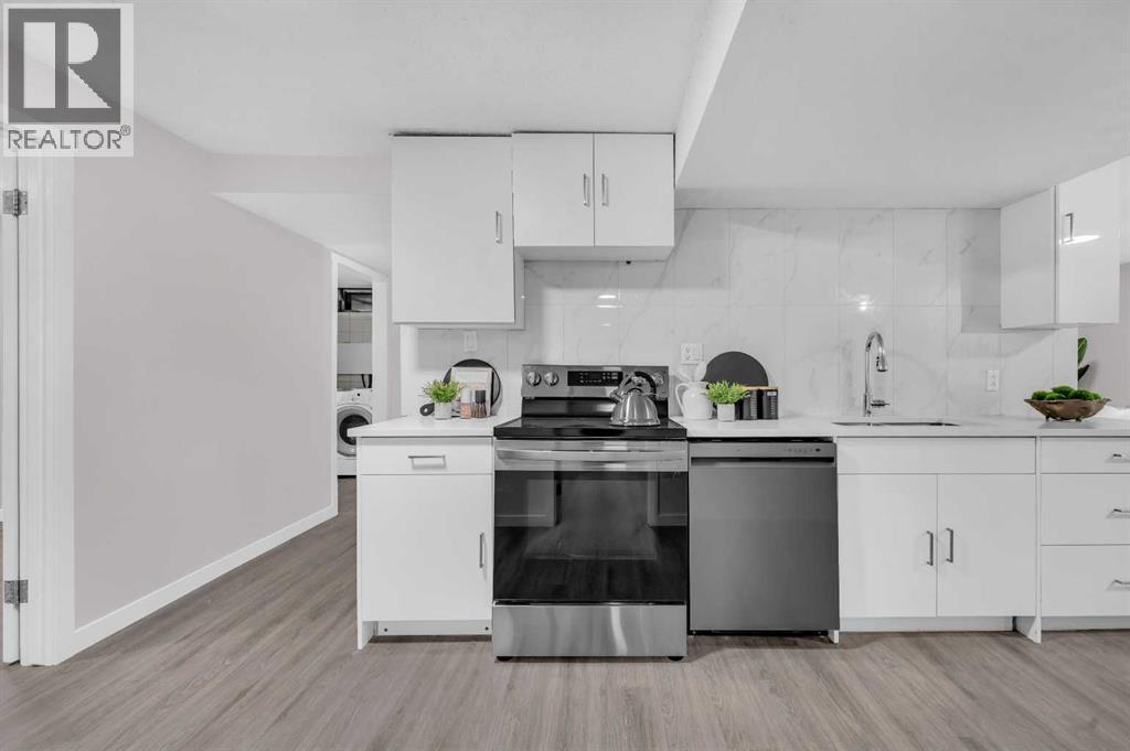 5868 Dalcastle Drive Nw, Calgary, AB - Indoor Photo Showing Kitchen With Upgraded Kitchen