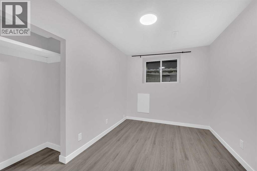 5868 Dalcastle Drive Nw, Calgary, AB - Indoor Photo Showing Other Room