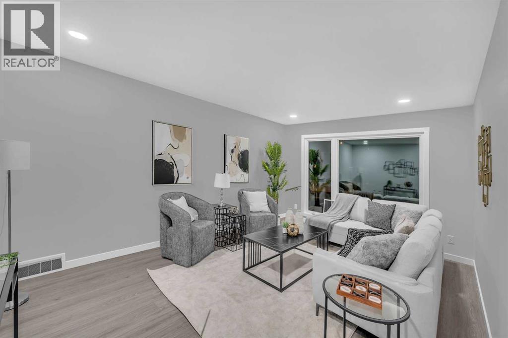 5868 Dalcastle Drive Nw, Calgary, AB - Indoor Photo Showing Living Room